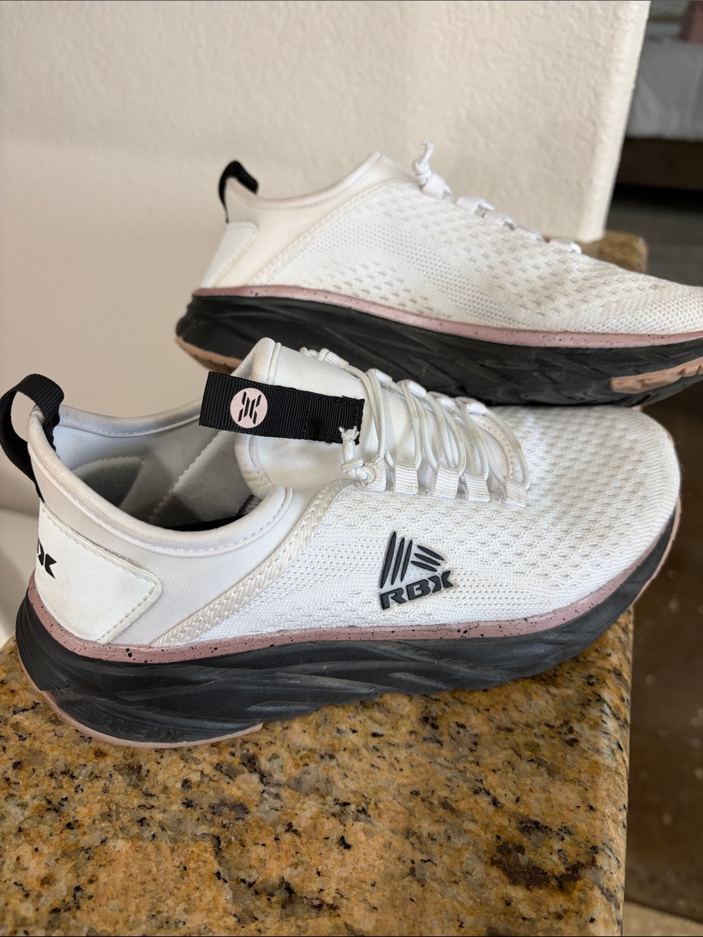 RBX womens White Athletic Sneakers with Pink Accent
